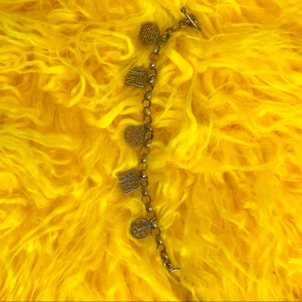 Beautiful, soft, silver Lenox Chinese Luck bracelet
